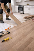 Laminate (wood core) per sqft (material included up to $3.25 flooring, $1.25 underlayment/moisture-barrier, $.70 baseshoe)